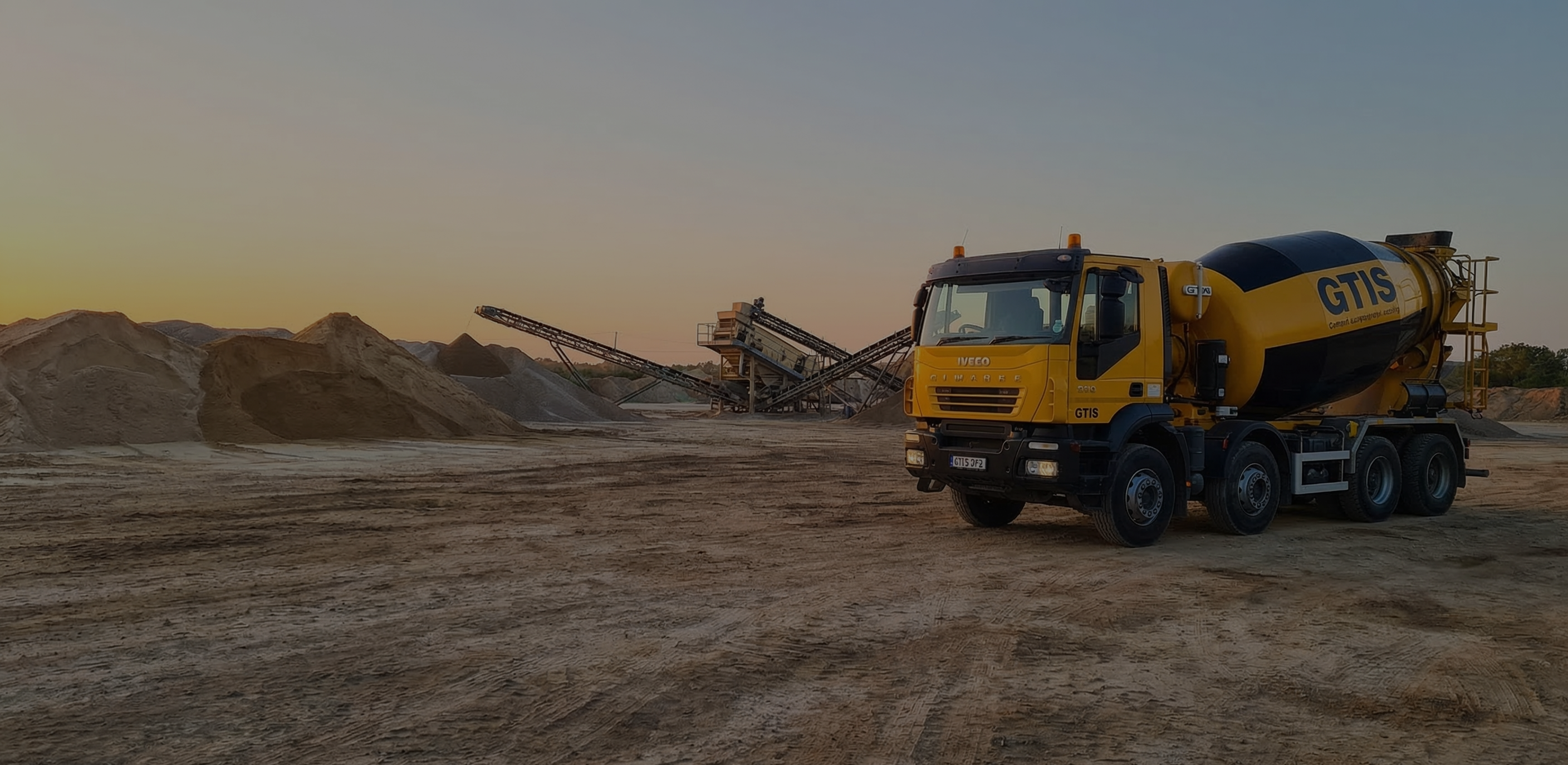 GTIS ready mix concrete trucks delivering to a construction site in Dubai